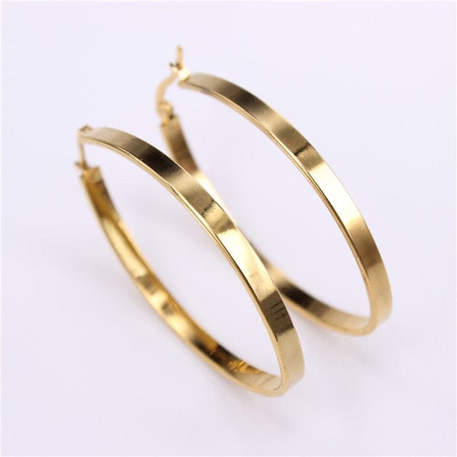 Spruced Roost Earrings gold color 50mm Flat Oval Smooth Hoop Earrings - 2 Colors - 3 Sizes