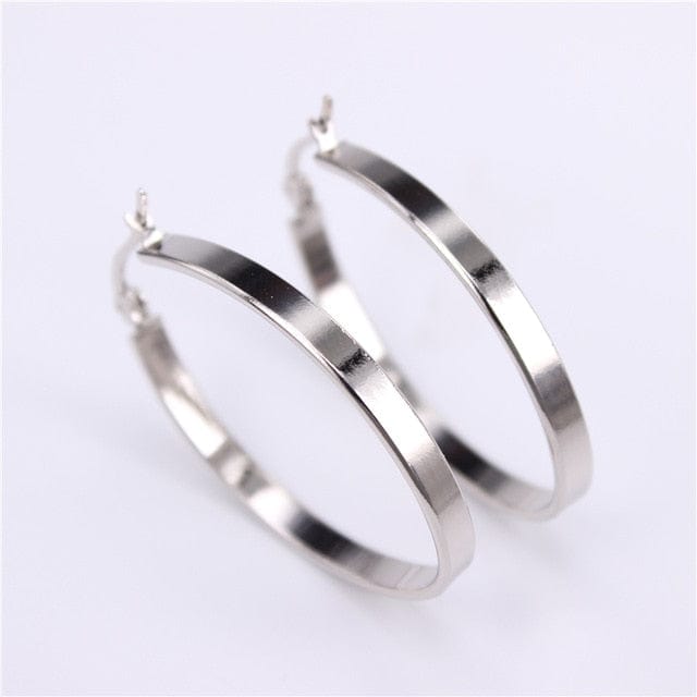 Spruced Roost Earrings silver color 50mm Flat Oval Smooth Hoop Earrings - 2 Colors - 3 Sizes